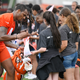 Cleveland Browns quarterback Deshaun Watson signs autographs after an NFL football practice at the team’s training facility, Wednesday, June 1, 2022, in Berea, Ohio.